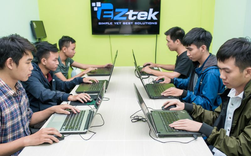 The professional team at EZTEK providing world-class custom software development services globally